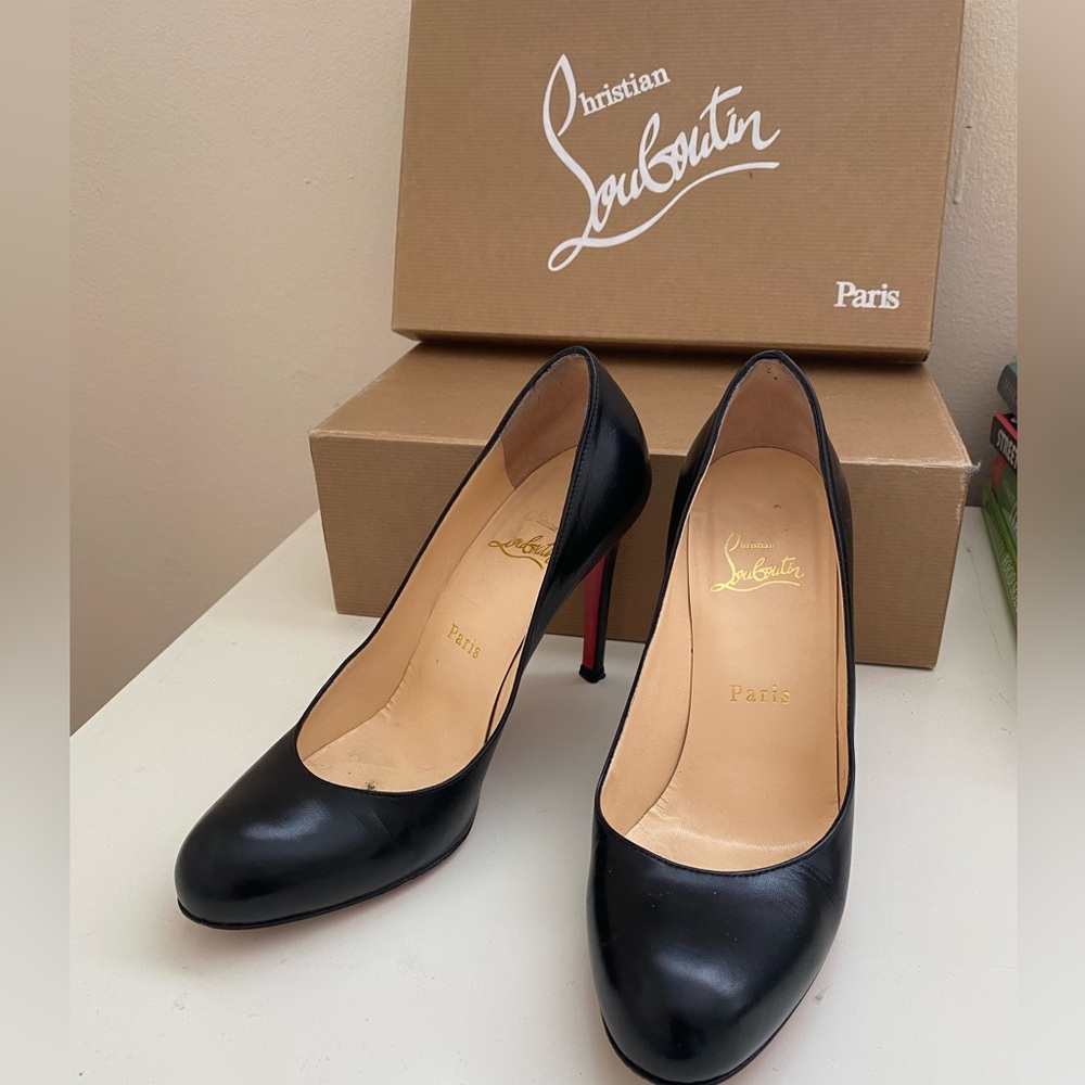 Black round toe Christian Louboutin heels